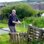 Kate hasn't captured well in this photo how much I'm enjoying myself sorting out the compost. I wished I had some 'after' photos to share to show how much better organised our compost area is. 